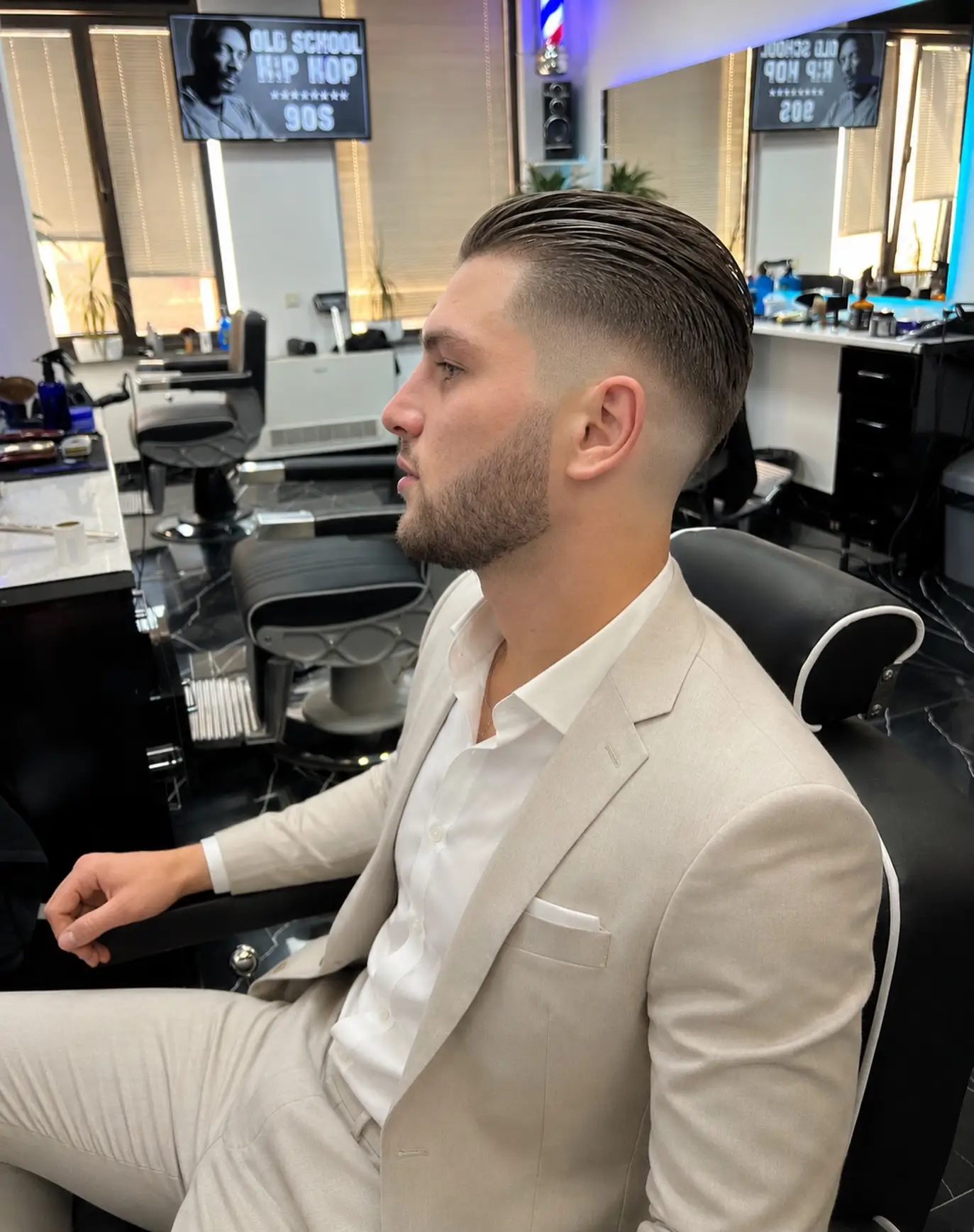 21 Professional Men's Hairstyles for the Office and Beyond 6 barber.harout 1781286729