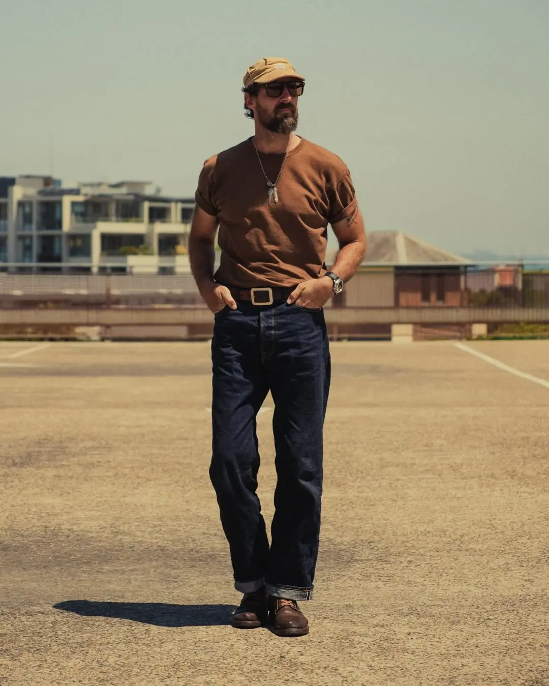 Light Blue Jeans Outfit Men Over 40 Actually Look Good In 15 Brown T Shirt and Cuffed Dark Jeans