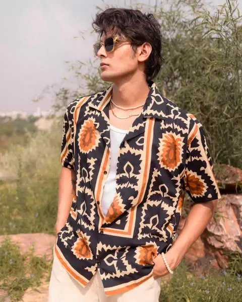 11 Stylish Men Summer Wear Ideas for Hot Days 7 Printed Shirt and Light Trousers
